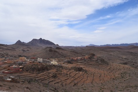 Near-mystic villages perched amongst the steep hillsides. Terraces climb the hills waiting for rain.